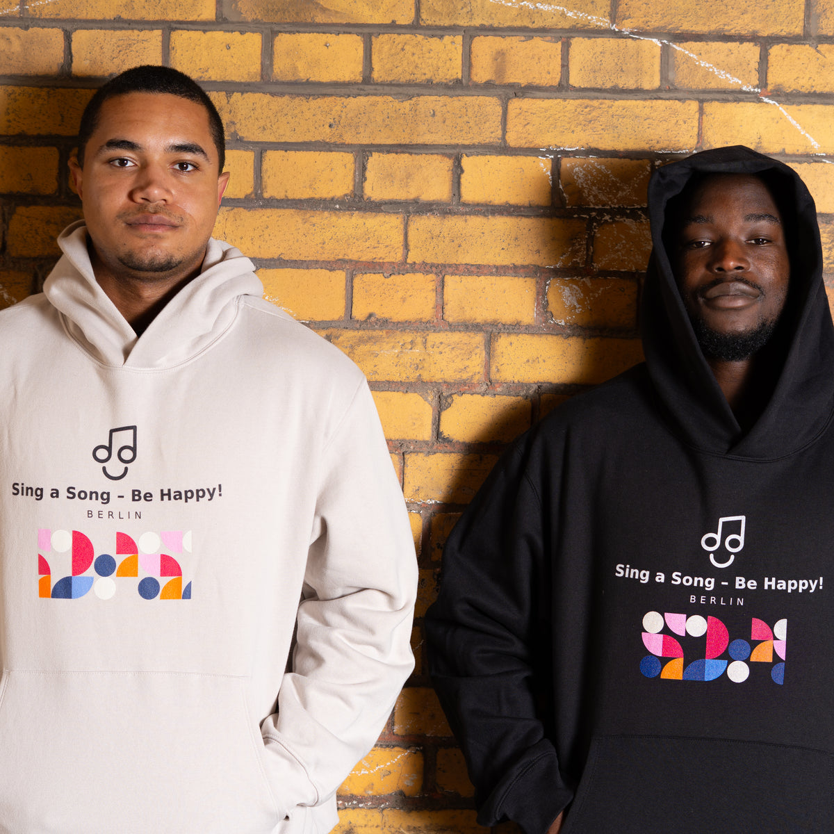 Sing a Song – Be Happy! Hoodie Unisex Oversized Schwarz