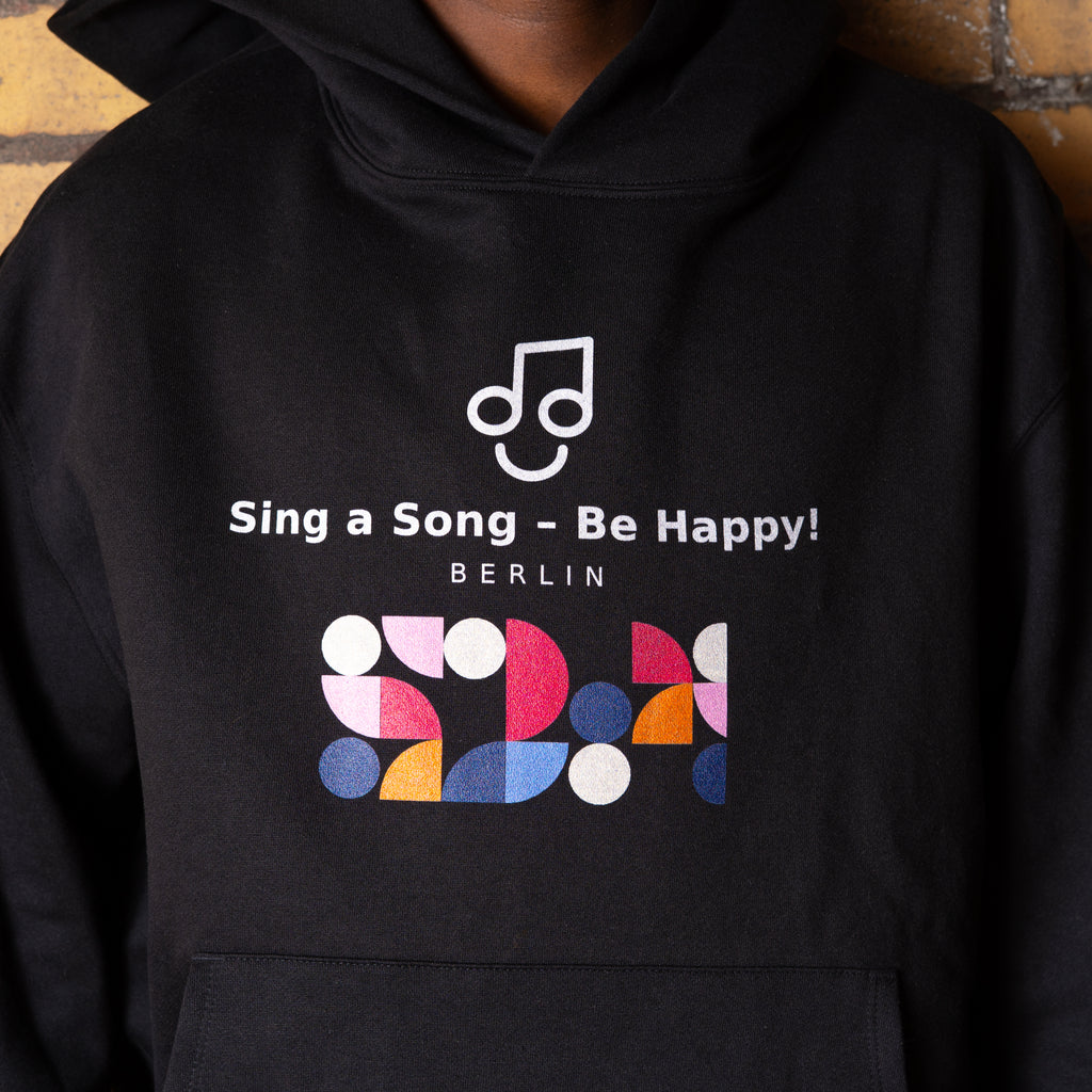 Sing a Song – Be Happy! Hoodie Unisex Oversized Schwarz