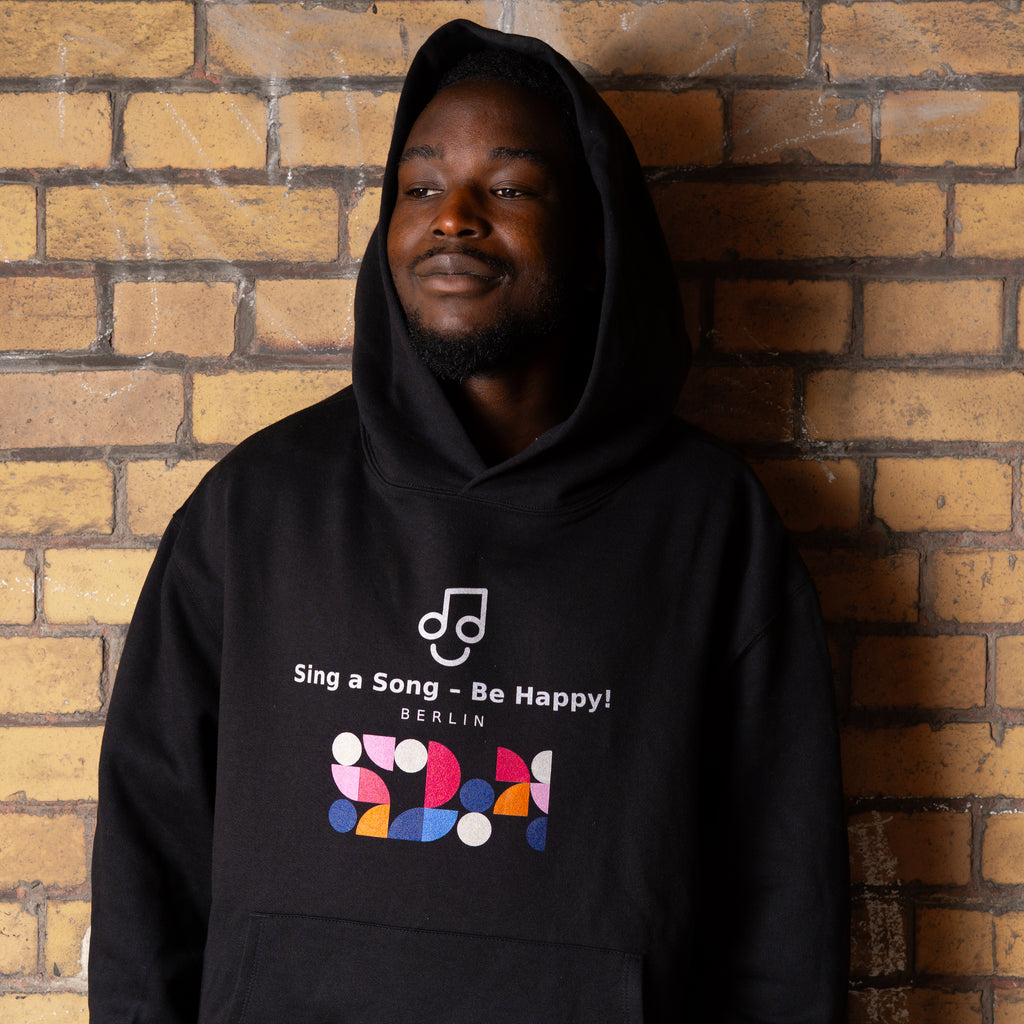 Sing a Song – Be Happy! Hoodie Unisex Oversized Schwarz