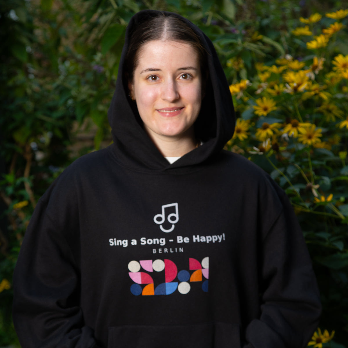 Sing a Song – Be Happy! Hoodie Unisex Oversized Schwarz