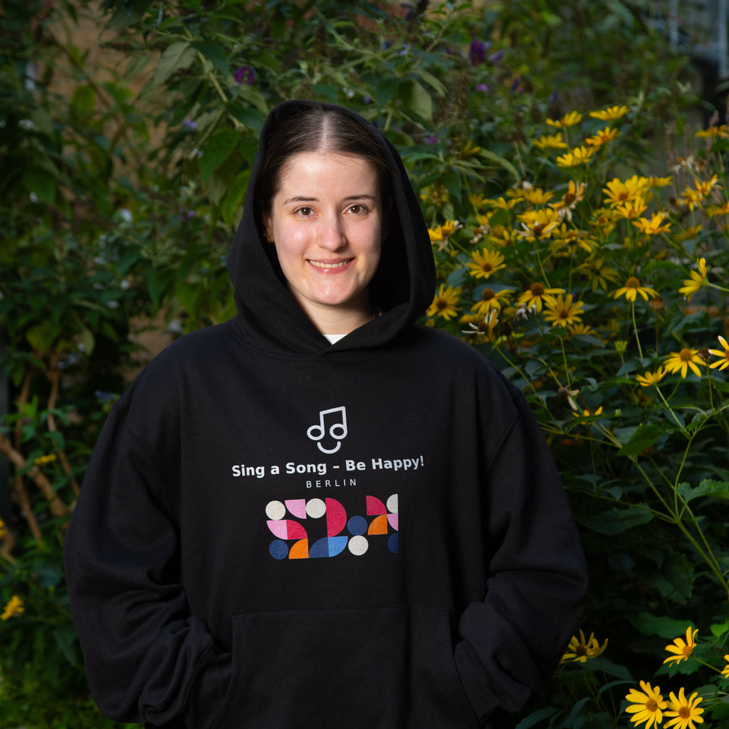 Sing a Song – Be Happy! Hoodie Unisex Oversized Schwarz