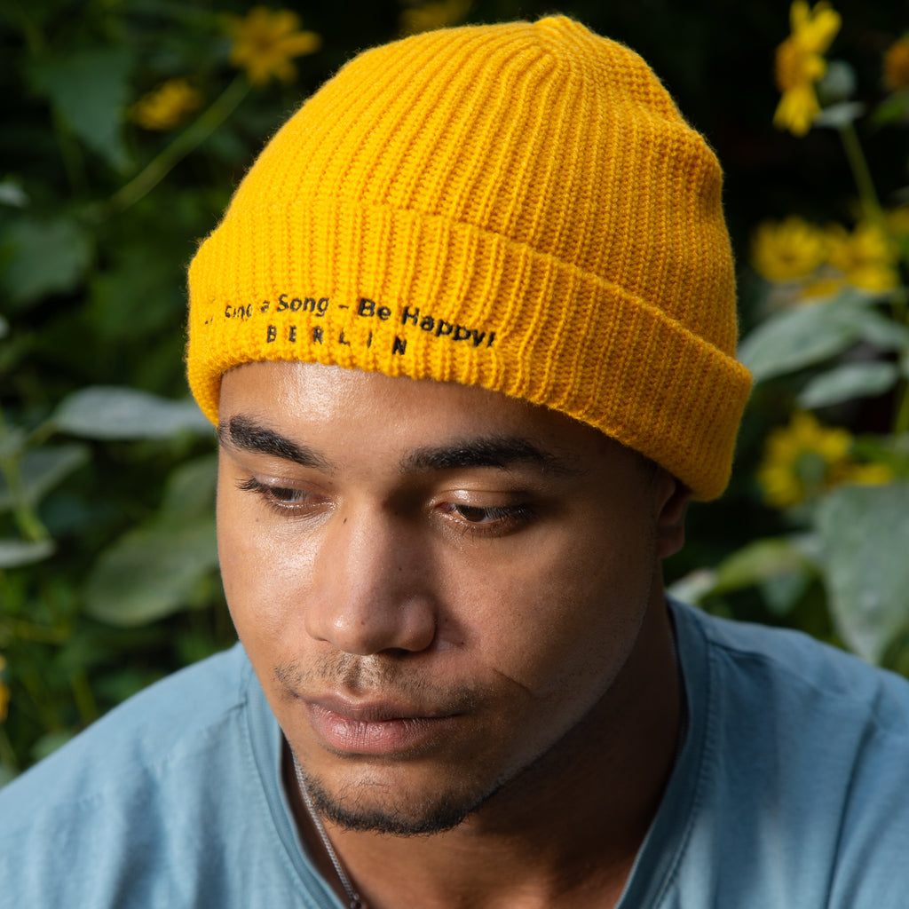 Sing a Song – Be Happy! Beanie Goldgelb