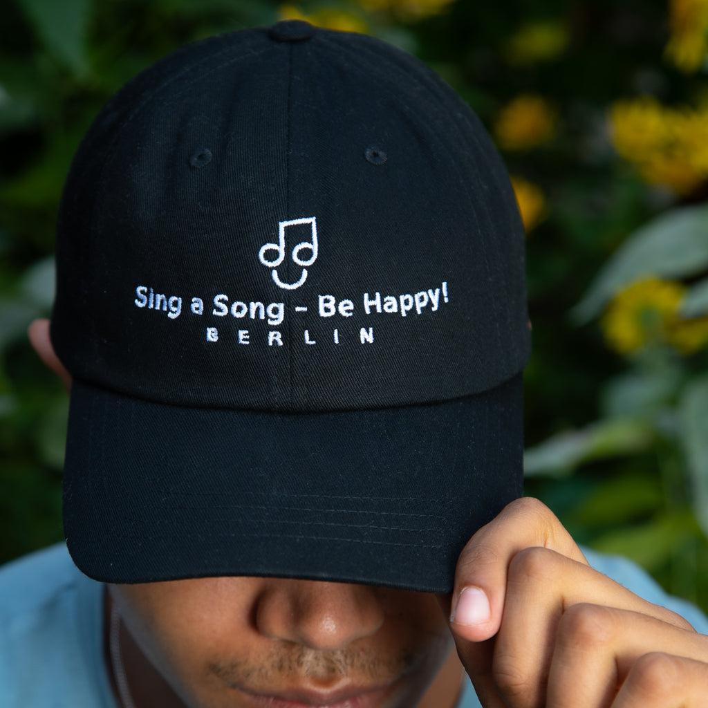 Sing a Song – Be Happy! Cap Schwarz