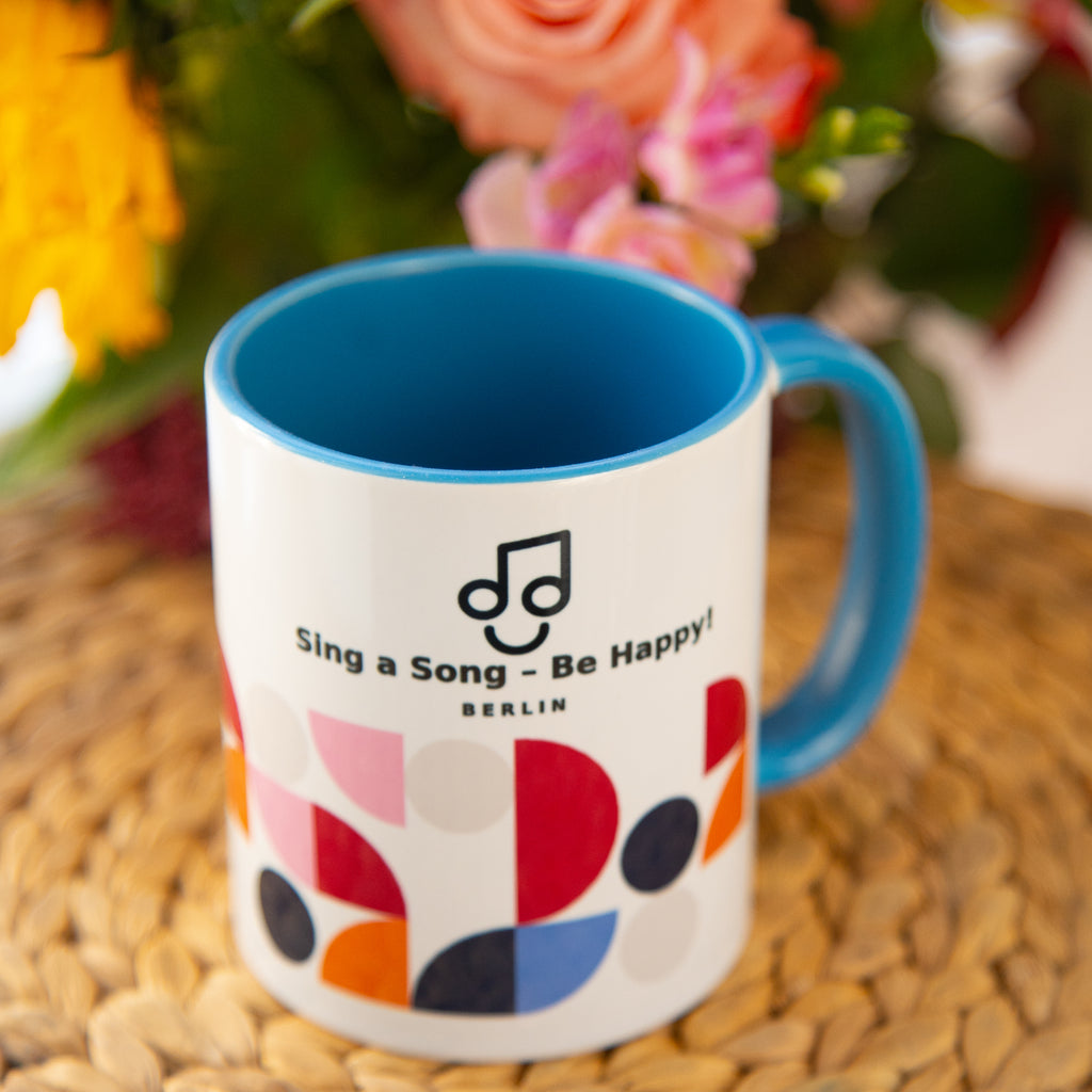 Sing a Song – Be Happy! Tasse mit farbiger Innenseite